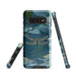 Nature-inspired phone case featuring a dragonfly over calm water with blue and green forest tones.