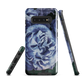 Designer phone case with a bold blue rose artwork and glossy finish.