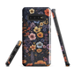 Phone case with colourful wildflowers on dark background, floral art design
