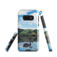 Phone case with a black swan on a calm lake, New Zealand hills in the background. Art by NZ designer Ben Hart.