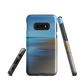 Ocean Breeze phone case with abstract blue and sandy tones inspired by sea and sky.