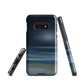 Dark abstract phone case with blue and grey streaks and glossy finish.