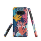 Colourful coral reef phone case design in pink, blue and yellow by NZ artist Ben Hart