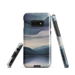 Phone case with moody blue and purple layered mountain and lake landscape artwork