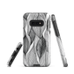A minimalist phone case featuring fine black botanical linework in a repeating leaf pattern.