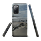 Phone case with artwork of Riversdale Beach, Masterton – rocks, waves and sky by NZ artist Ben Hart.