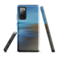 Ocean Breeze phone case with abstract blue and sandy tones inspired by sea and sky.