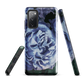 Designer phone case with a bold blue rose artwork and glossy finish.
