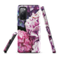 Designer phone case with pink and purple hydrangea floral artwork.