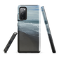 Phone case with a scenic photo of Riversdale Beach and ocean waves.