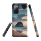 Phone case with Cathedral Cove beach and sunset scene, featuring soft skies and sea stack, by NZ artist Ben Hart.