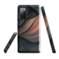 Phone case with flowing abstract design in black, copper and charcoal tones, inspired by dusk shadows