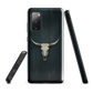 Longhorn skull set against a dark, textured backdrop - protective phone case.
