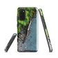Resting Place phone case with aerial artwork of river rocks, green bush, and driftwood in a New Zealand stream.