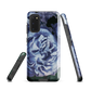 Designer phone case with a bold blue rose artwork and glossy finish.