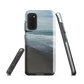 Phone case with a scenic photo of Riversdale Beach and ocean waves.