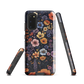 Phone case with colourful wildflowers on dark background, floral art design