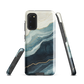 An elegant abstract phone case inspired by layered coastal forms in blue and teal tones.