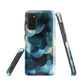 A modern abstract phone case featuring layered blue forms and soft flowing shapes.