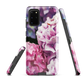 Designer phone case with pink and purple hydrangea floral artwork.