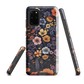 Phone case with colourful wildflowers on dark background, floral art design