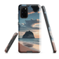 Phone case with Cathedral Cove beach and sunset scene, featuring soft skies and sea stack, by NZ artist Ben Hart.