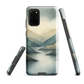 Phone case with soft mountain and valley design in misty green, blue, and golden tones