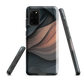 Phone case with flowing abstract design in black, copper and charcoal tones, inspired by dusk shadows