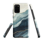 An elegant abstract phone case inspired by layered coastal forms in blue and teal tones.