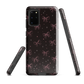 Midnight Bow seamless repeat pattern — pink hand-drawn ribbon bows and sparkle stars on a black background