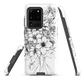 Black and white floral phone case with hand-drawn lilies and wildflowers