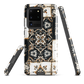 Moroccan tile pattern phone case in black, white, and gold tones with vintage-inspired design.