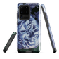 Designer phone case with a bold blue rose artwork and glossy finish.
