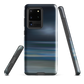Dark abstract phone case with blue and grey streaks and glossy finish.