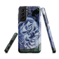 Designer phone case with a bold blue rose artwork and glossy finish.