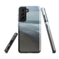 Phone case with a scenic photo of Riversdale Beach and ocean waves.