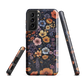Phone case with colourful wildflowers on dark background, floral art design