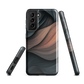 Phone case with flowing abstract design in black, copper and charcoal tones, inspired by dusk shadows