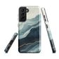 An elegant abstract phone case inspired by layered coastal forms in blue and teal tones.