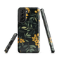 NZ Kowhai phone case with native yellow floral and green leaves on black background by designer Ben Hart.