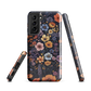 Phone case with colourful wildflowers on dark background, floral art design