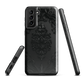 Black embossed damask phone case with gothic baroque pattern.
