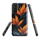 Phone case with bold orange bird of paradise flowers on dark background.