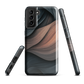 Phone case with flowing abstract design in black, copper and charcoal tones, inspired by dusk shadows