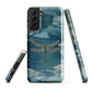 Nature-inspired phone case featuring a dragonfly over calm water with blue and green forest tones.