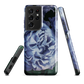 Designer phone case with a bold blue rose artwork and glossy finish.