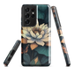 Phone case with ivory water lily, green leaves, and butterfly accents on dark background