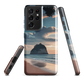 Phone case with Cathedral Cove beach and sunset scene, featuring soft skies and sea stack, by NZ artist Ben Hart.