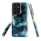 A modern abstract phone case featuring layered blue forms and soft flowing shapes.