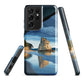 Artistic Cathedral Cove coastal designer phone case with arch rock, blue ocean and golden cliffs